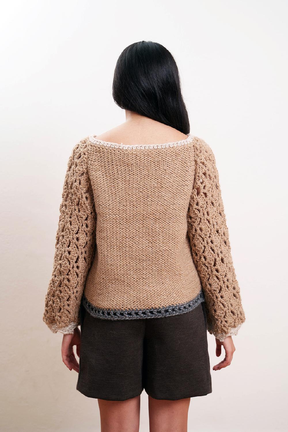 Tricot à Porter Maglia traforata scollo a barca manica ampia fondo diritto Vendita